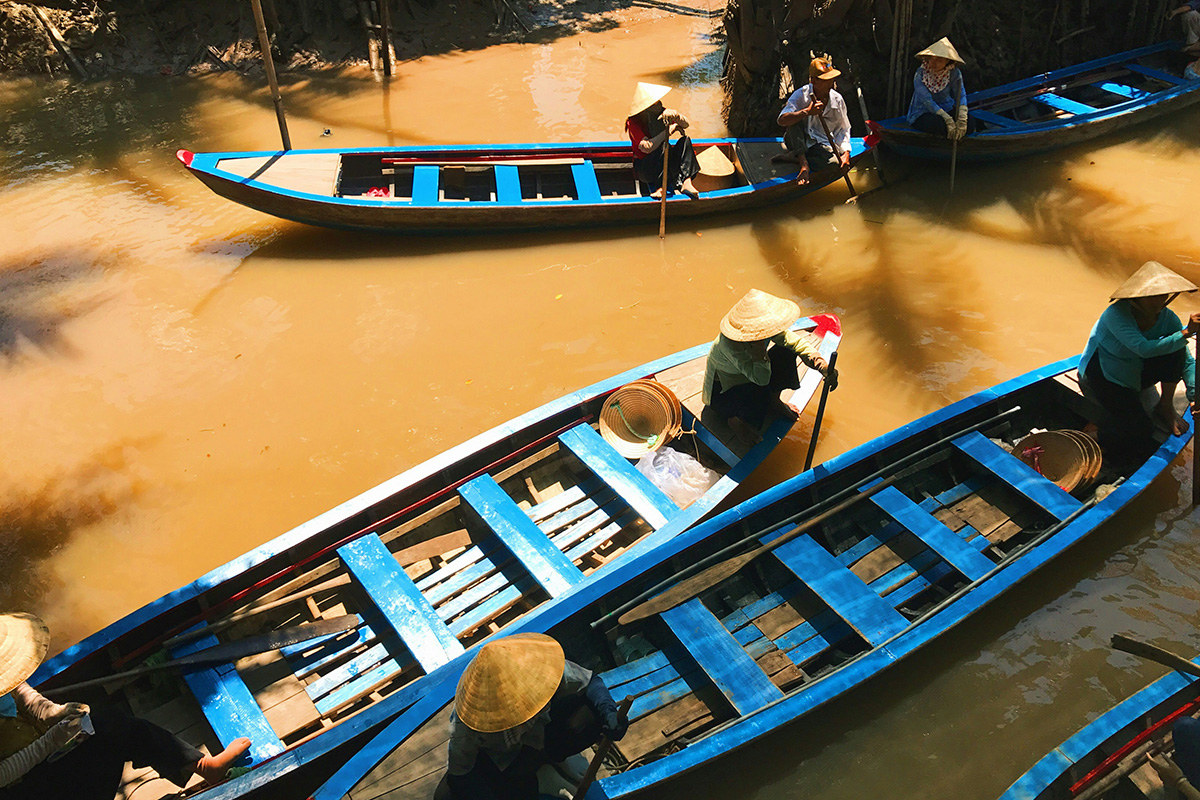 Boat on Mekong delta by Anne Lin