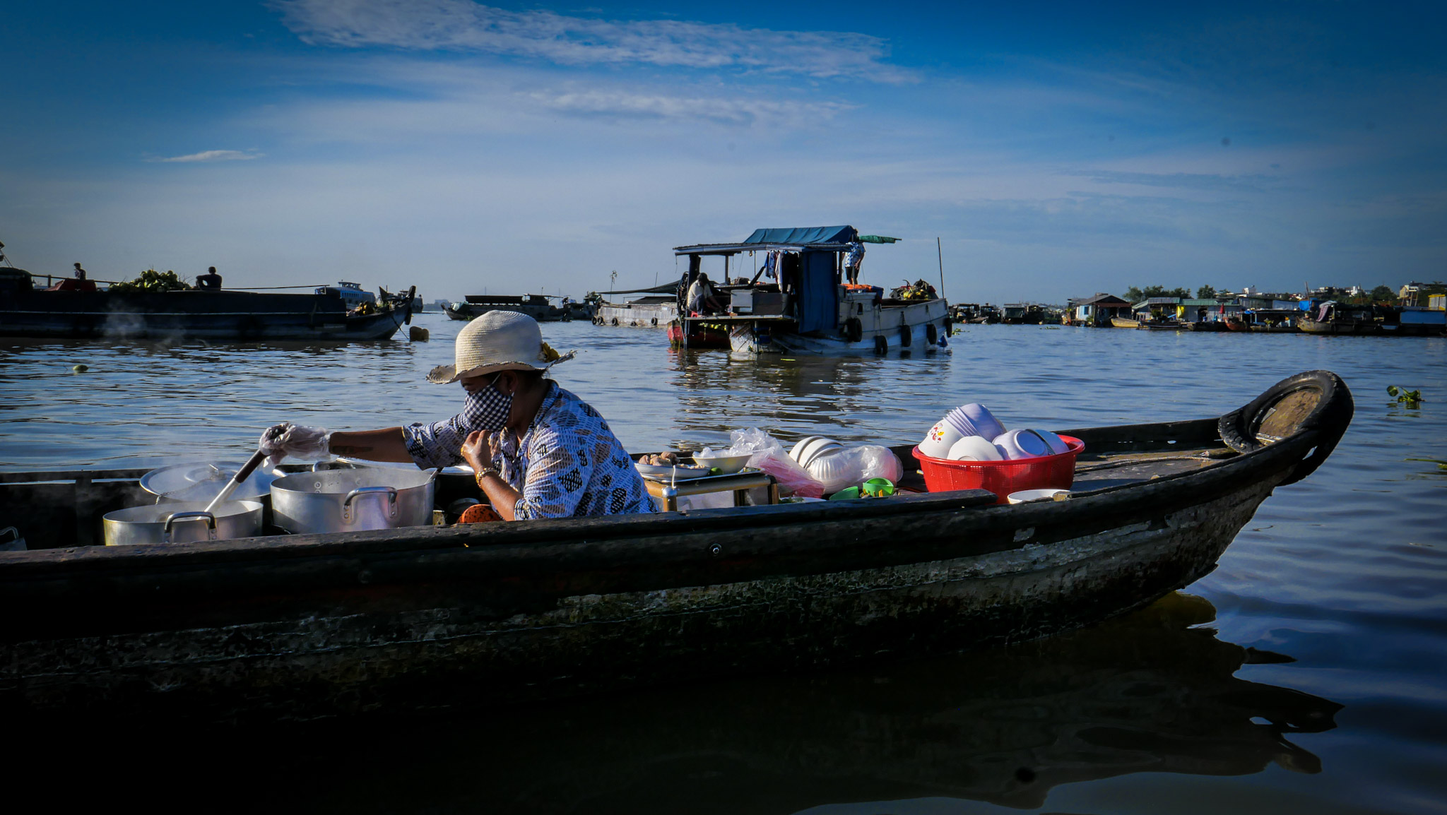 a local family’s boat in Long Xuyen floating market