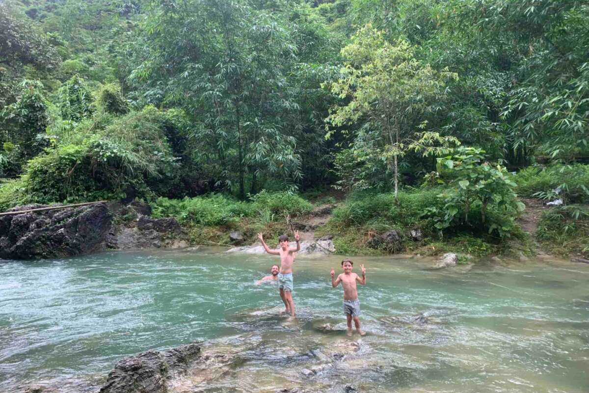 Bathing in the waterfall at Lam Thuong