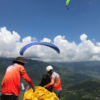 Duo paragliding over Mu Cang Chai Rice Terrace