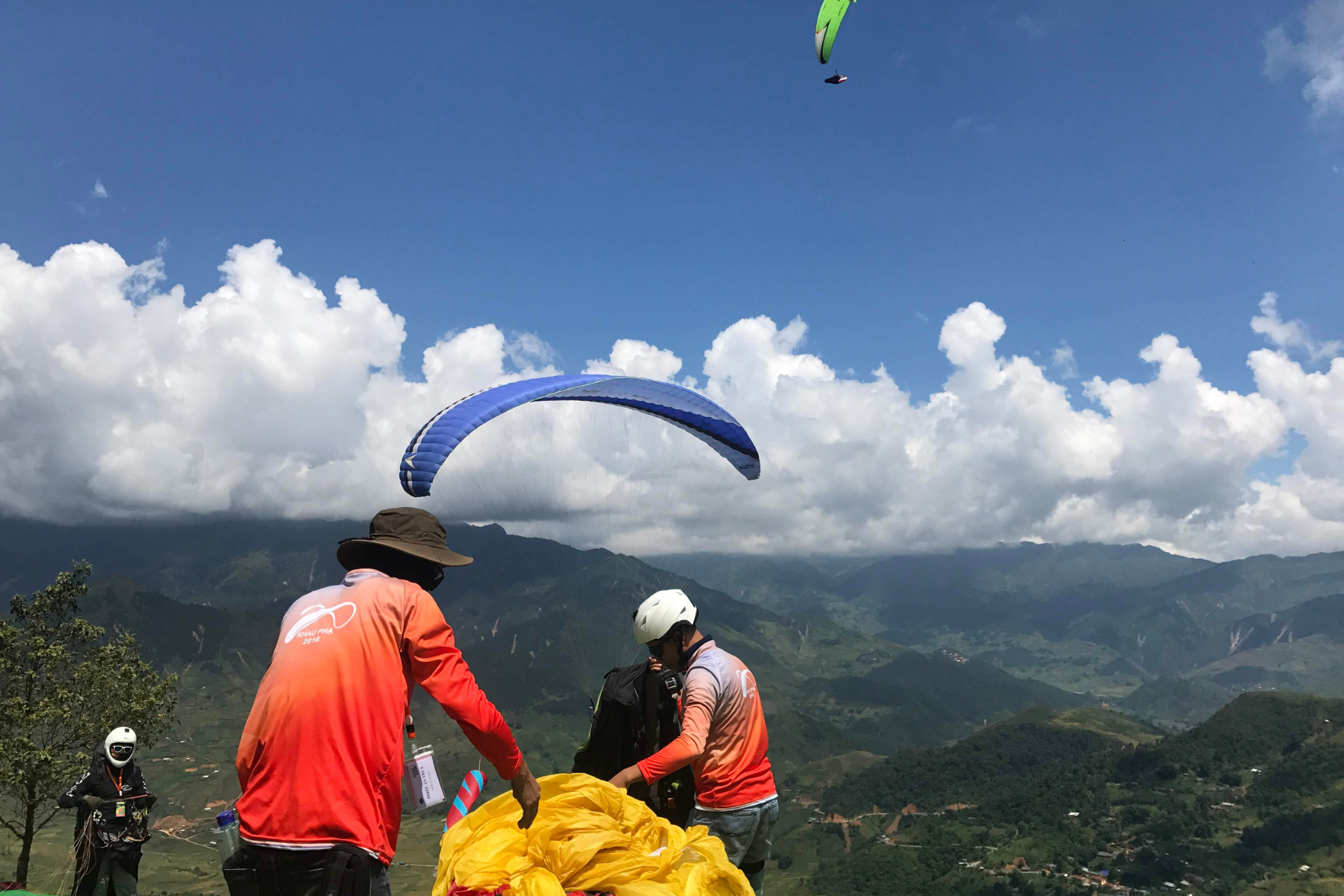 Duo paragliding over Mu Cang Chai Rice Terrace