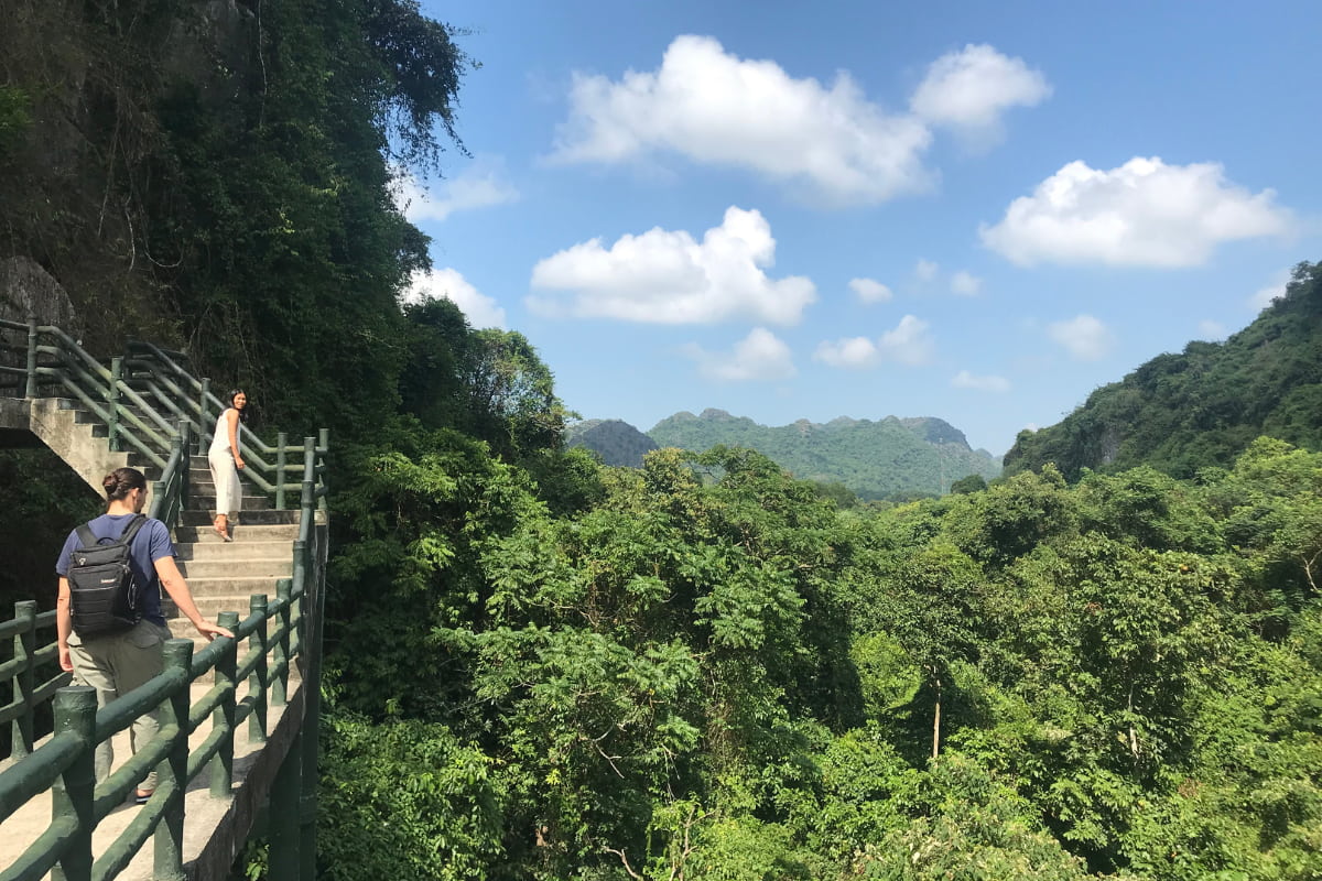 Hiking to Hai Quan Peak for a fantastic view of the whole village and Lan Ha Bay