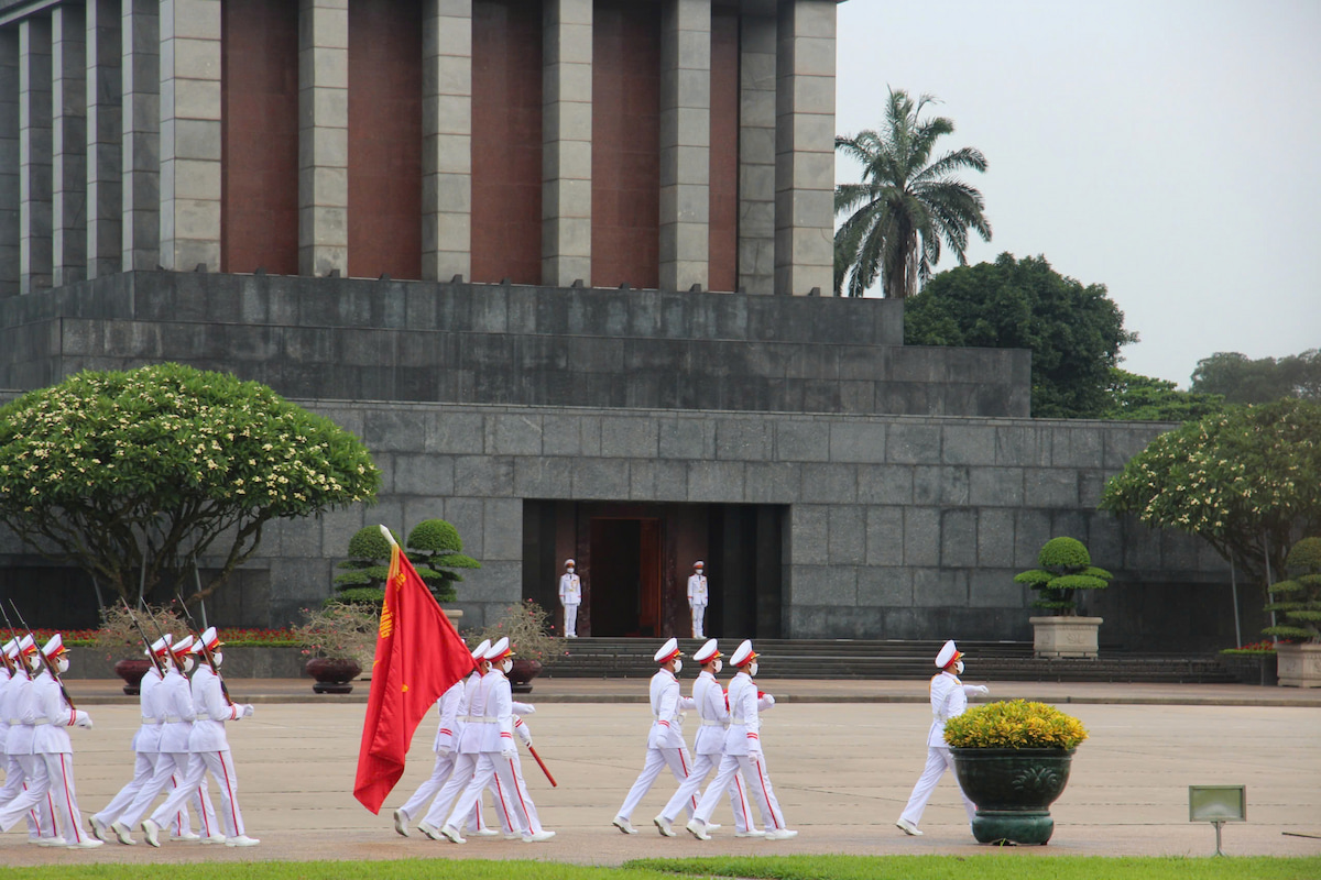 Admire daily flag-raising ceremony at the Ho Chi Minh Mausoleum