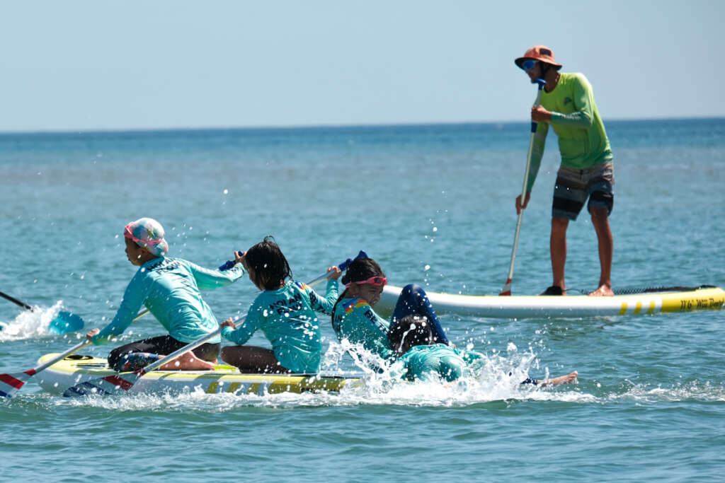 Surfing in the beach